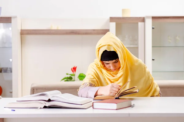 Female student in hijab preparing for exams — Stock Photo, Image