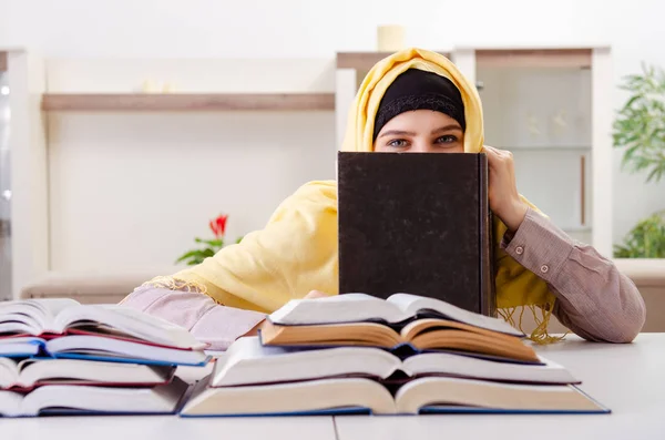 Female student in hijab preparing for exams — Stock Photo, Image