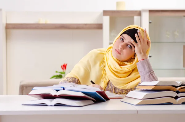 Female student in hijab preparing for exams — Stock Photo, Image