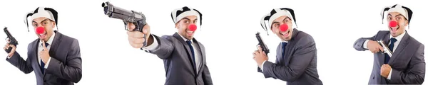 Zabawny clown biznesmen z pistolet — Zdjęcie stockowe