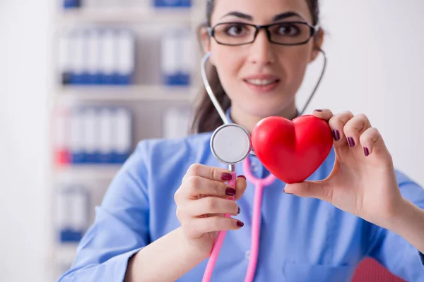 Young female doctor working in the clinic — Stock Photo, Image