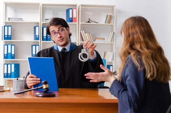 Young woman visiting male lawyer — Stock Photo, Image