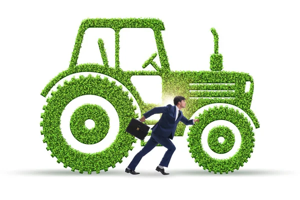 Geschäftsmann mit grünem Ökofahrzeug — Stockfoto