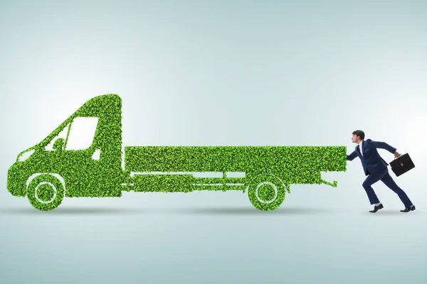 拥有绿色生态车的商人 — 图库照片
