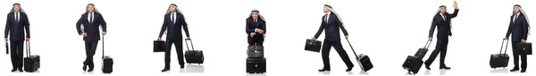 Arabský obchodník s kufrem izolované na bílém — Stock fotografie