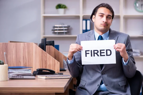 Young male employee being fired from his work — Stock Photo, Image