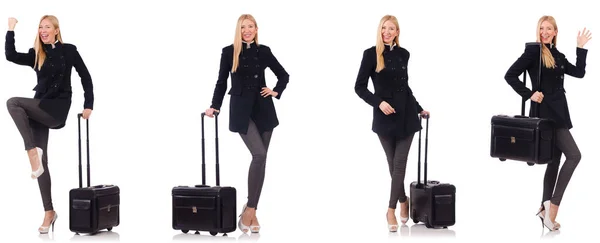Beautiful woman in black coat with suitcase — Stock Photo, Image