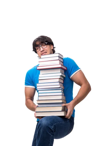 Mannelijke student met veel boeken geïsoleerd op wit — Stockfoto