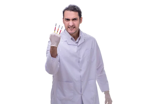 Joven médico guapo con jeringa aislada en blanco — Foto de Stock