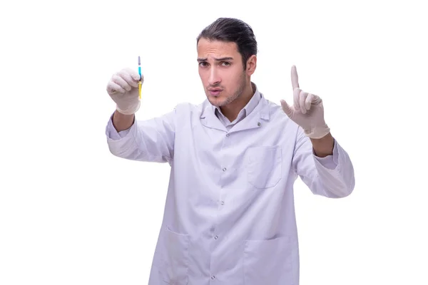 Junge hübsche Arzt mit Spritze isoliert auf weiß — Stockfoto