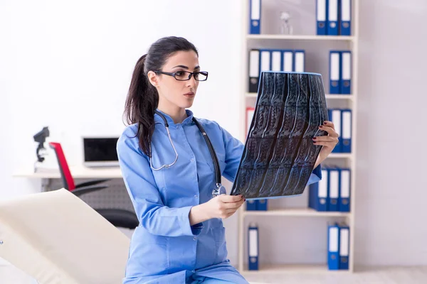 Young female doctor radiologist working in the clinic