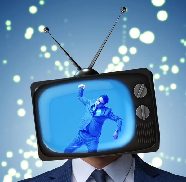 Man with television head in tv addiction concept