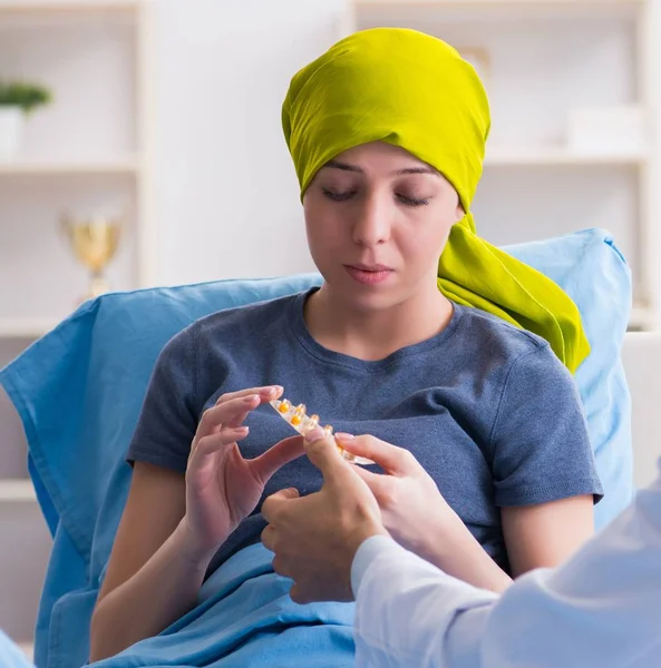 Cancer patient visiting doctor for medical consultation in clini