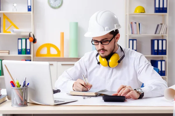 Young male architect working in the office — Stock Photo, Image