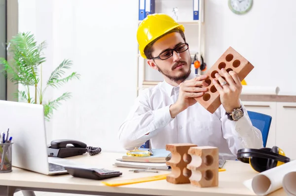 Young male architect working in the office — Stock Photo, Image