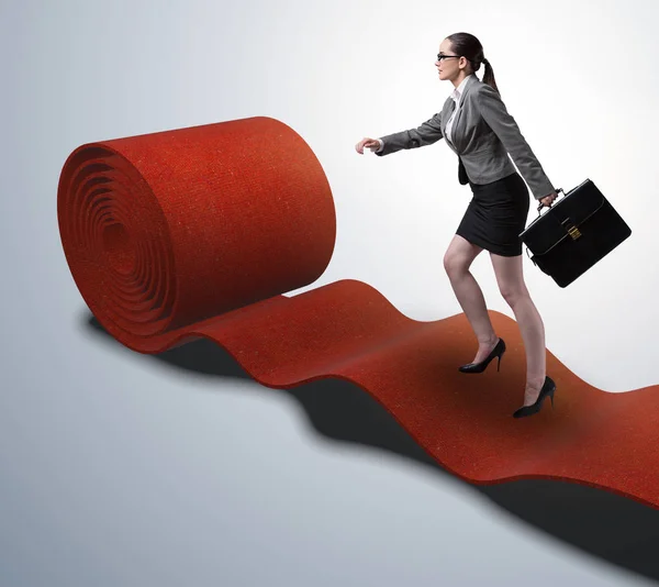 Businesswoman on the red carpet in success concept — Stock Photo, Image