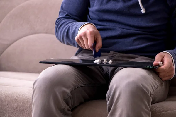 Young man having problems with narcotics at home — Stock Photo, Image