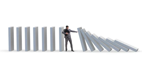 İş adamı iş konseptinde domino etkisini engelliyor — Stok fotoğraf