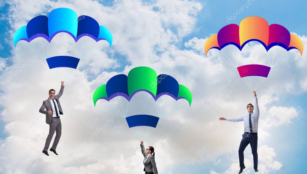 Business people falling down on parachutes