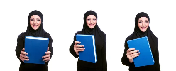 Mujer musulmana joven con libro sobre blanco — Foto de Stock