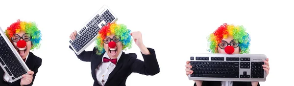 Funny clown with keyboard on white — Stock Photo, Image