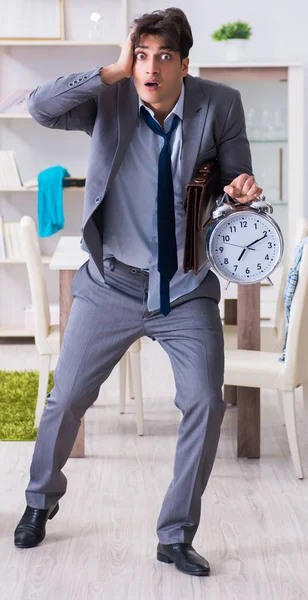 Businessman late for office due to oversleeping after overnight — Stock Photo, Image
