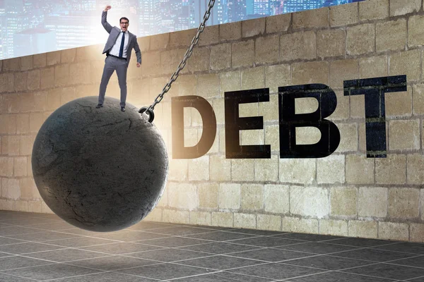 Концепція боргу та кредиту з бізнесменом — стокове фото