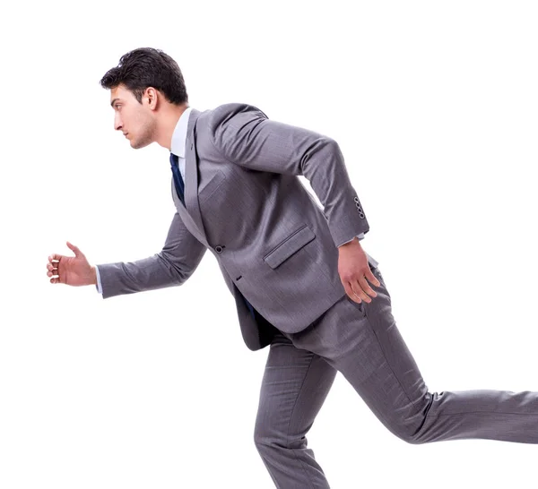 Jovem empresário correndo para a frente isolado em branco — Fotografia de Stock