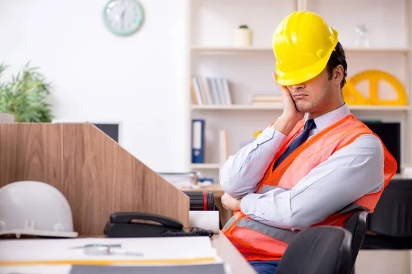 Young male architect working in the office — Stock Photo, Image