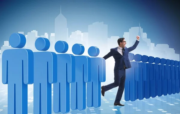 Standing out from crowd concept with businessman — Stock Photo, Image