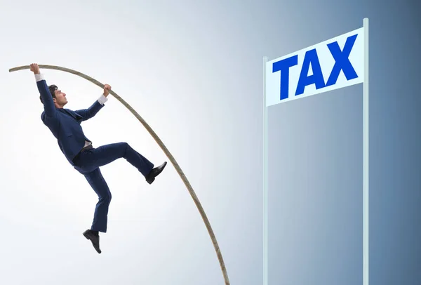 Businessman jumping over tax in tax evasion avoidance concept — Stock Photo, Image