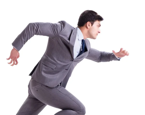 Young businessman running forward isolated on white — Stock Photo, Image