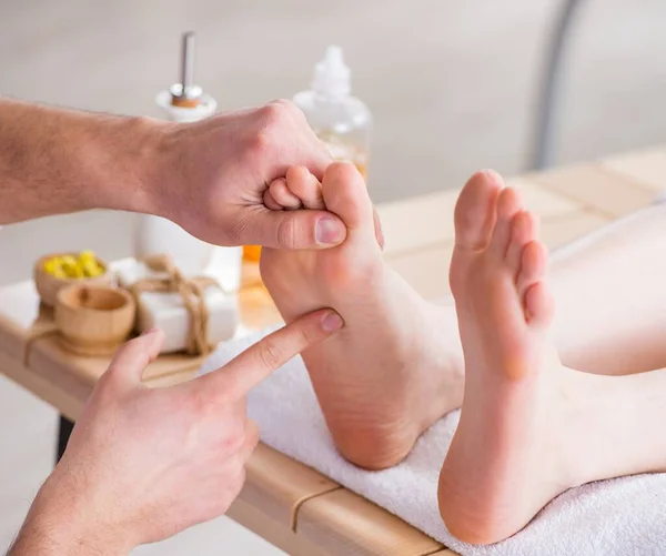 Foot massage in medical spa — Stock Photo, Image