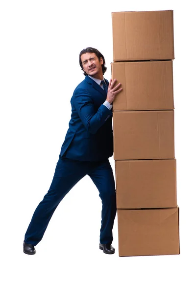 Mladý muž zaměstnanec s krabicemi izolované na bílém — Stock fotografie