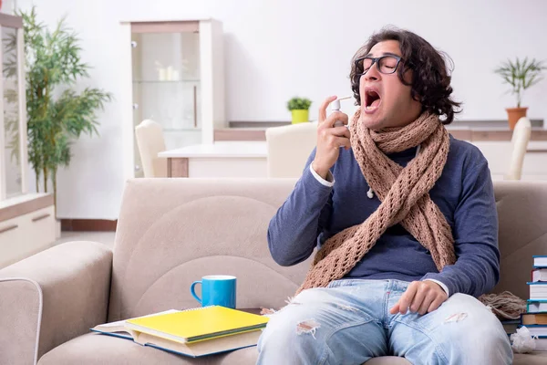 Sick male student suffering at home — Stock Photo, Image