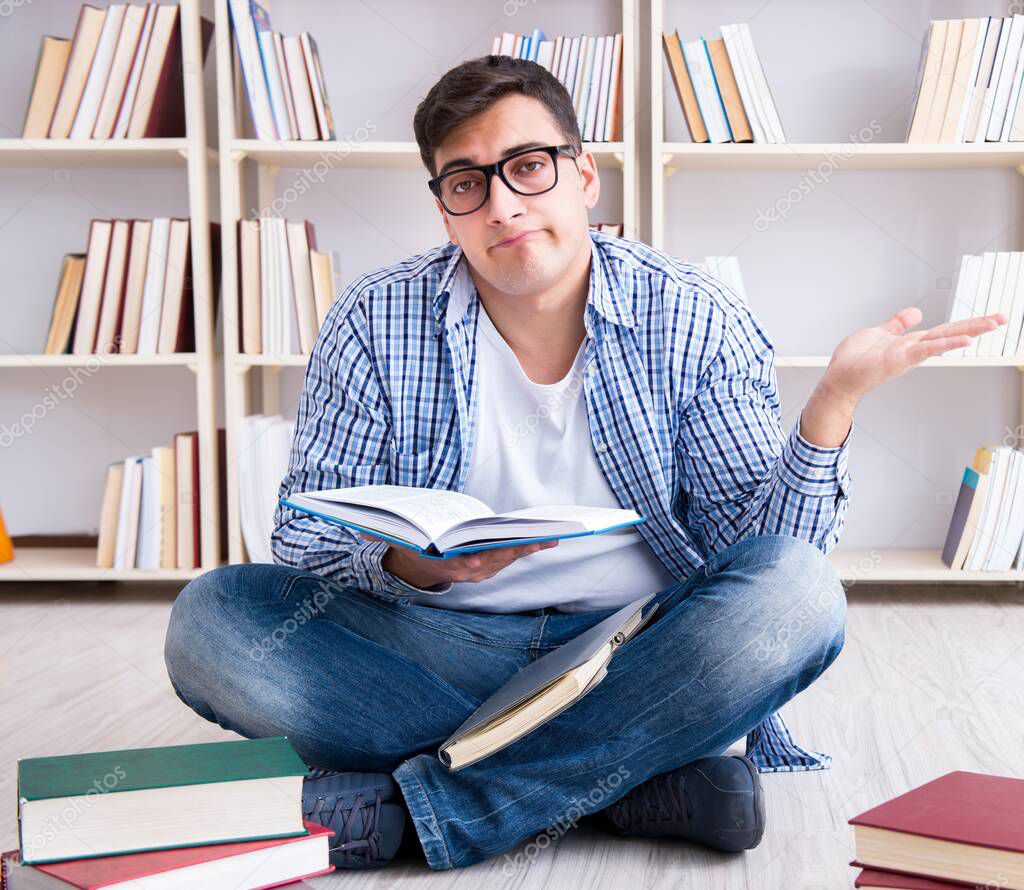 Young student studying with books