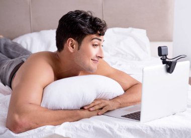 Young sexy man in online dating concept clipart