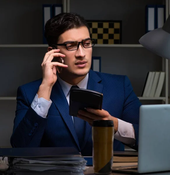 The auditor checking the accuracy of financial statements with c — Stock Photo, Image