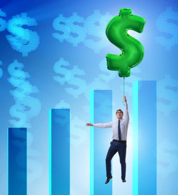 Dolar işareti üzerinde uçan bir iş adamı. Finansal olarak şişirilebilir balon.