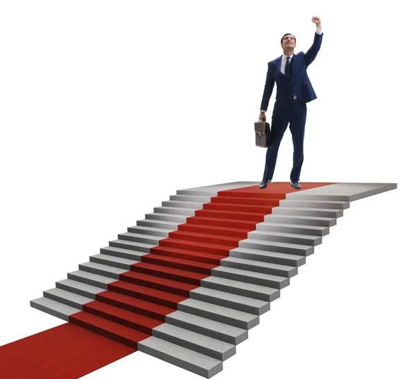 Jonge zakenman klimt trap en rode loper op witte rug gr. — Stockfoto