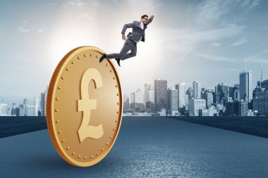 Businessman with giant golden pound coin clipart