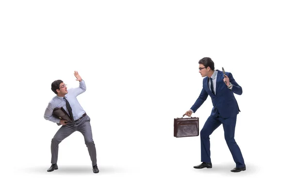 Businessman with gun threatening his competitor — Stock Photo, Image