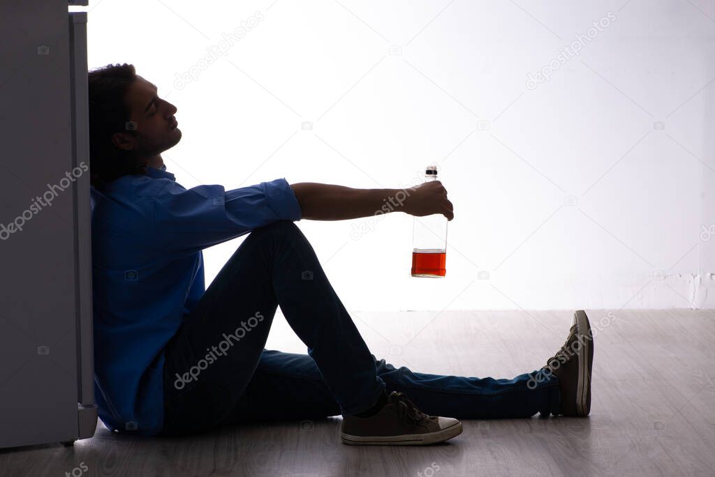Young man suffering from alcoholism