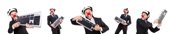 Grappige clown met toetsenbord geïsoleerd op wit — Stockfoto