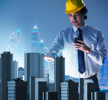 Gelecekçi mimar şehir planlaması yapıyor.