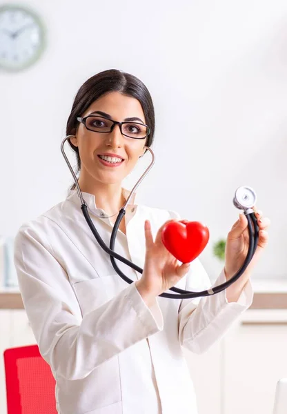 Young doctor in heart care concept — Stock Photo, Image