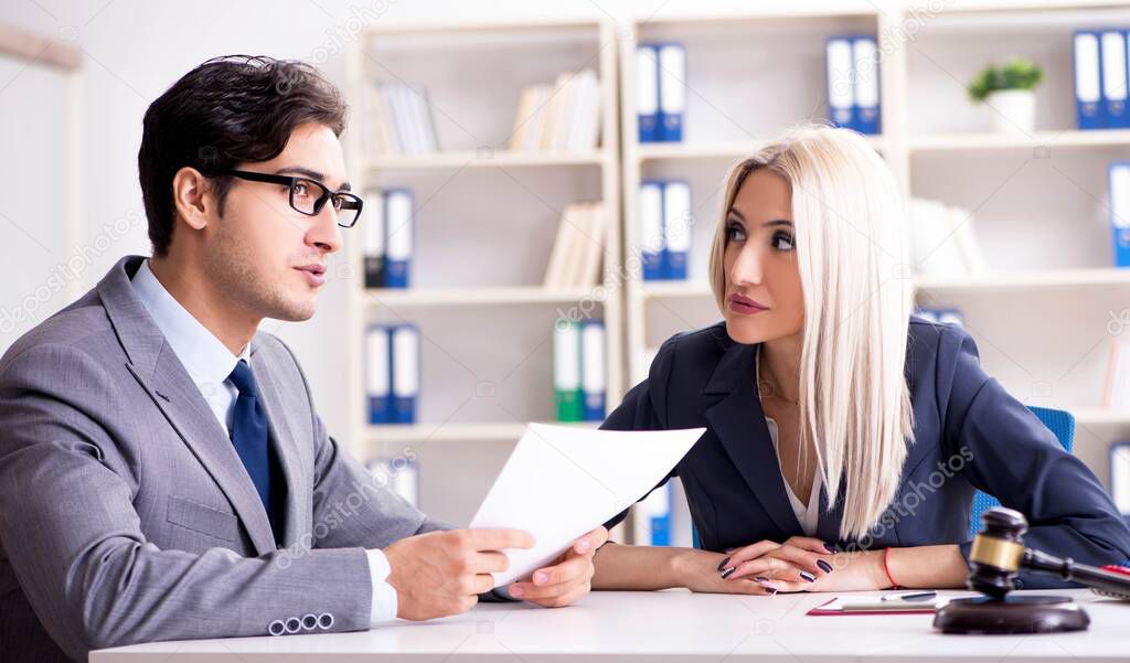 Lawyer discussing legal case with client