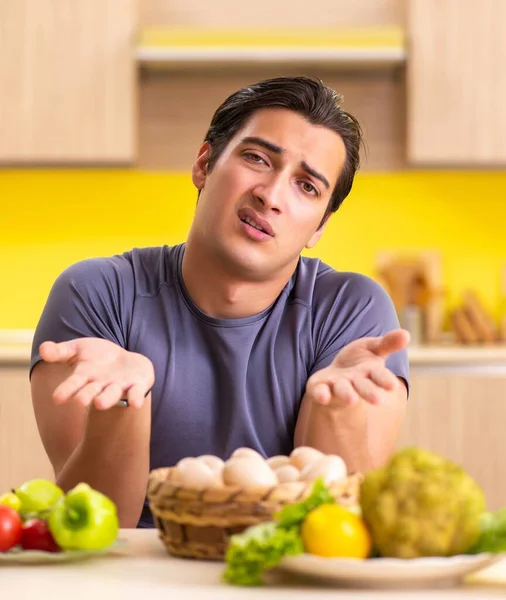 Young man in dieting and healthy eating concept — Stock Photo, Image