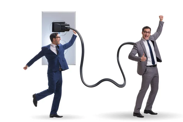 Businessman being powered by electricity and plug — Stock Photo, Image