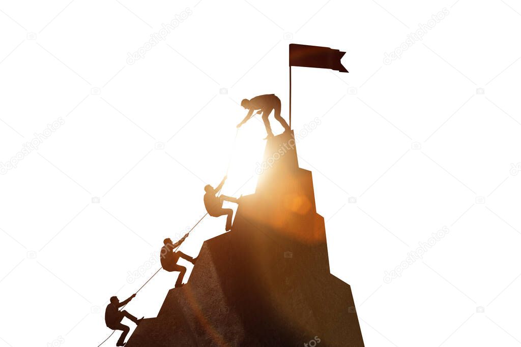 Concept of teamwork with team climbing mountain top